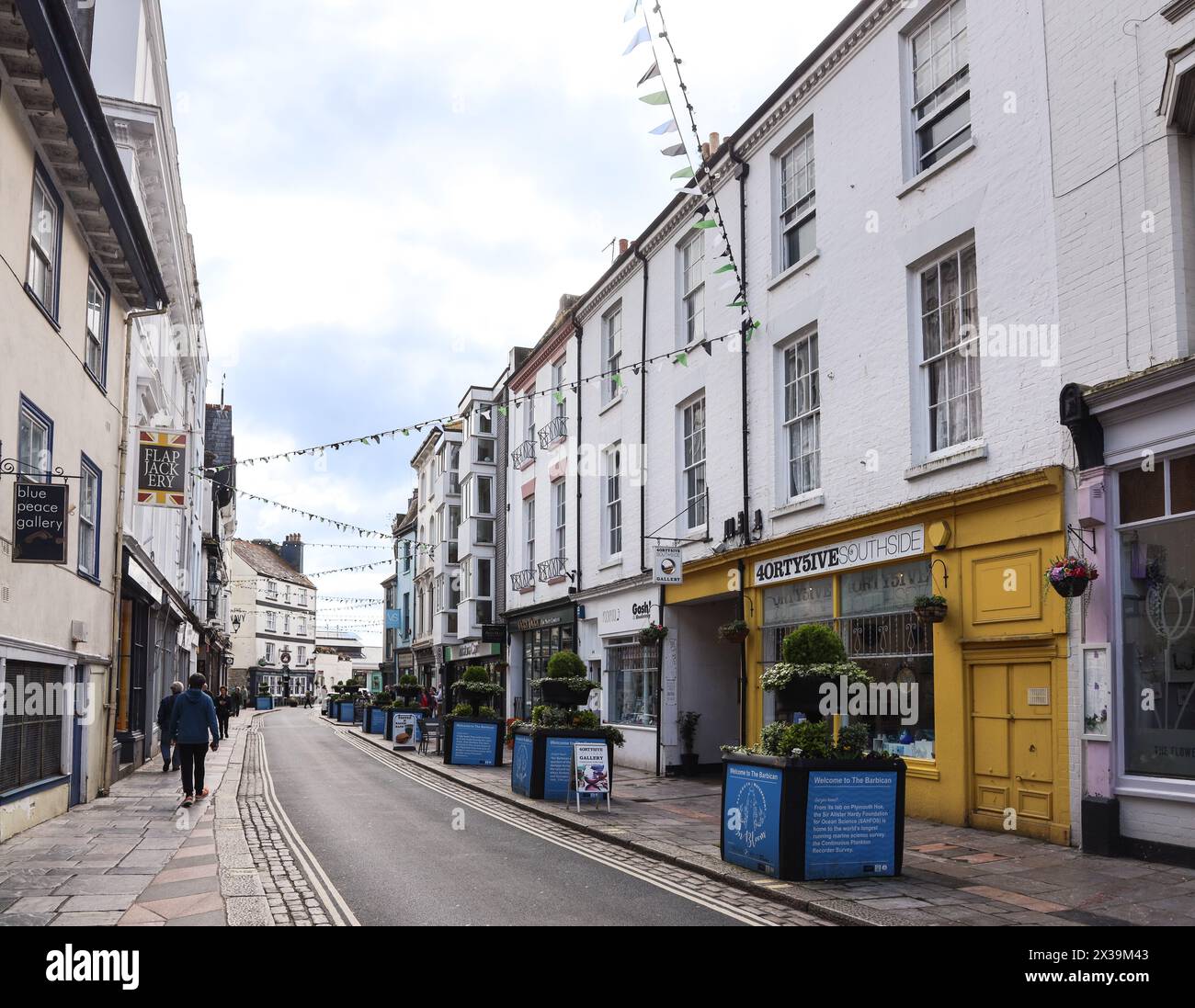 A row of independent shops on Plymouth’s Southside Street. Restaurants, gift shops; galleries and more attract locals and visitors alike to the cities Stock Photo