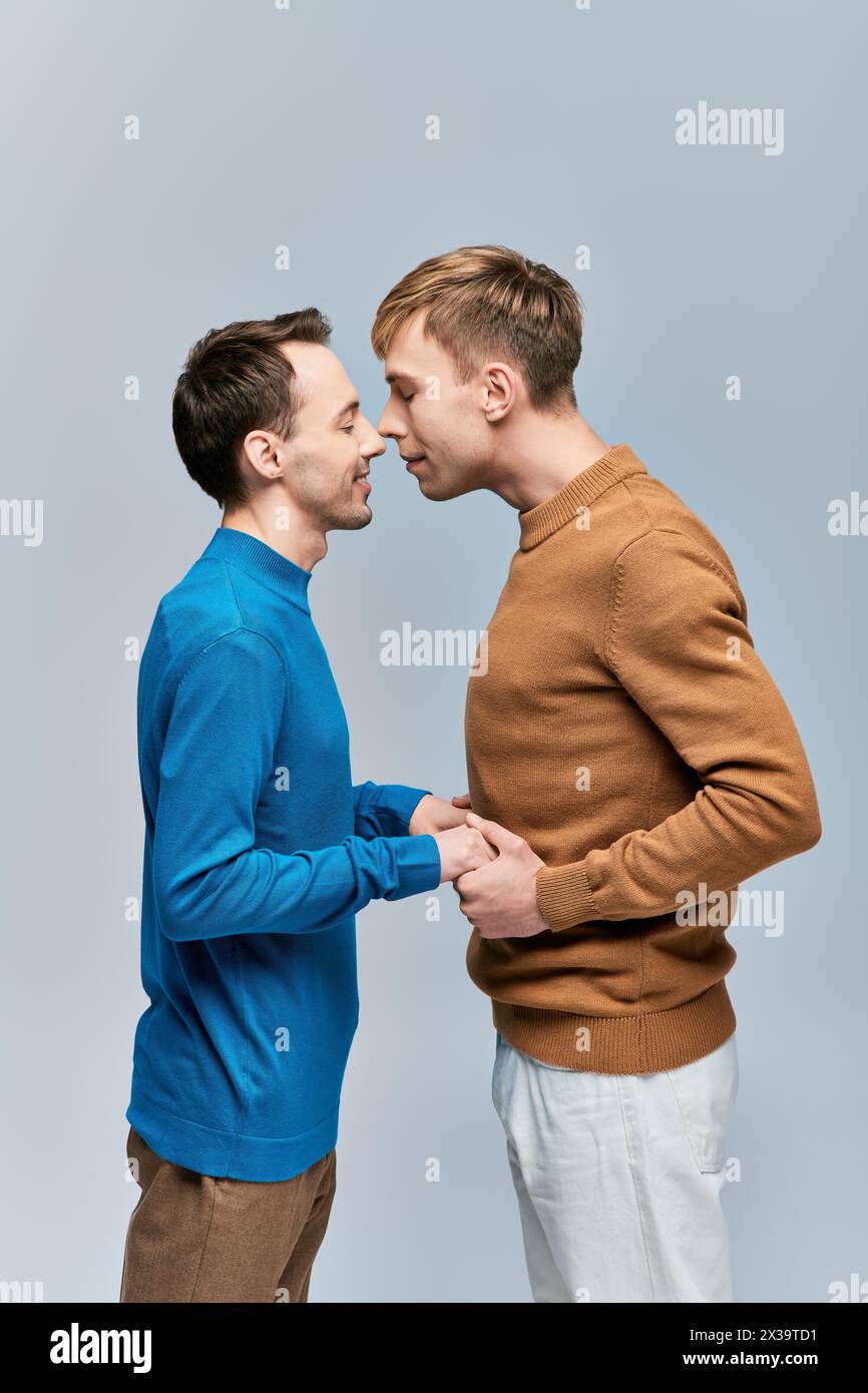 Two handsome young men together hi-res stock photography and images - Alamy