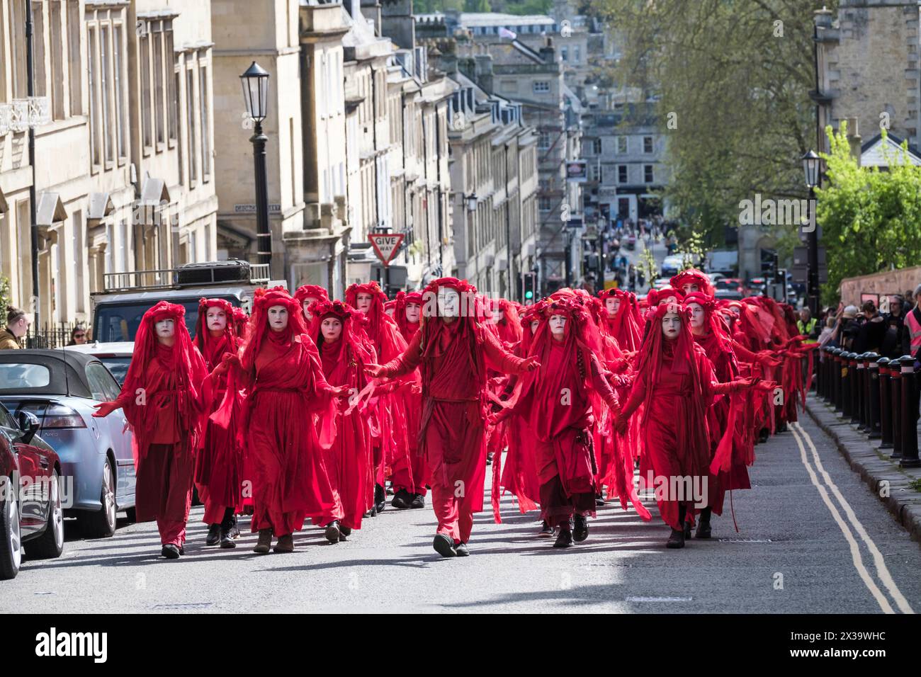 Extinction Rebellion hold a Funeral for Nature procession in the centre of Bath today. The Reb Rebels accompanied by drummers playing a funeral beat m Stock Photo