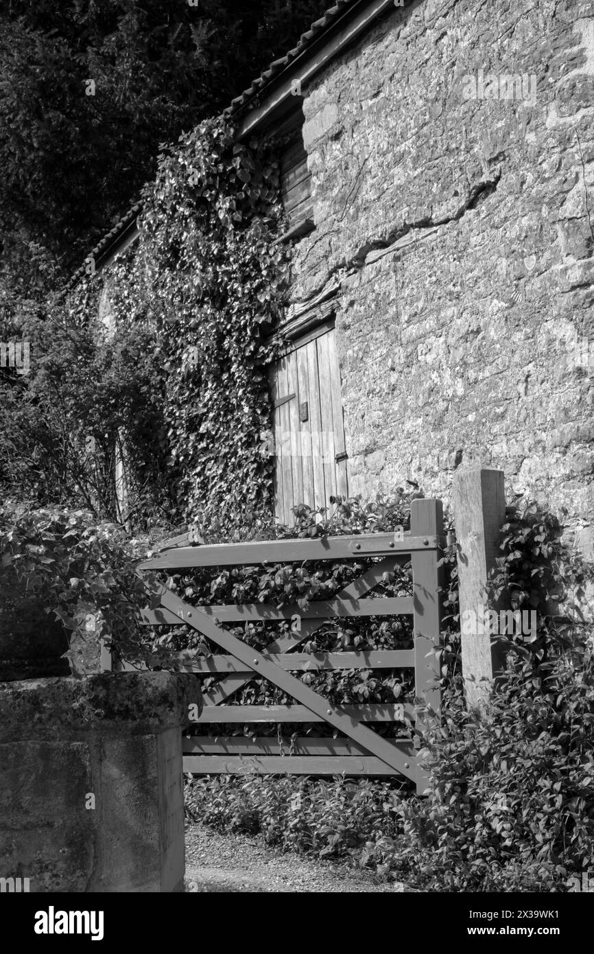 Around Wellow a picturesque village near Bath in Somerset UK A five bar gate Monochrome Low Contrast Stock Photo