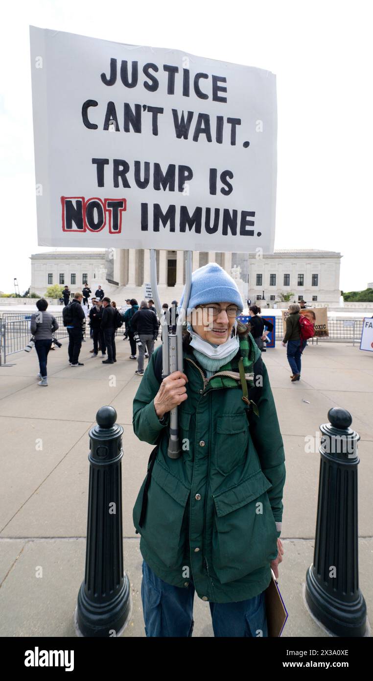 April 25, 2024 - Washington, District of Columbia, U.S. - People demonstrate outside the United States Supreme Court as the justices hear arguments about whether Donald Trump can be held to account on charges that he attempted to overthrow the results of the 2020 presidential election. Trump's lawyers claim that he is immune from prosecution because he was president, a plea reminiscent of Richard Nixon's statement during a 1977 interview with David Frost, ''When a president does it, that means it's not illegal.(Credit Image: © Brian Cahn/ZUMA Press Wire) EDITORIAL USAGE ONLY! Not for Commercia Stock Photo