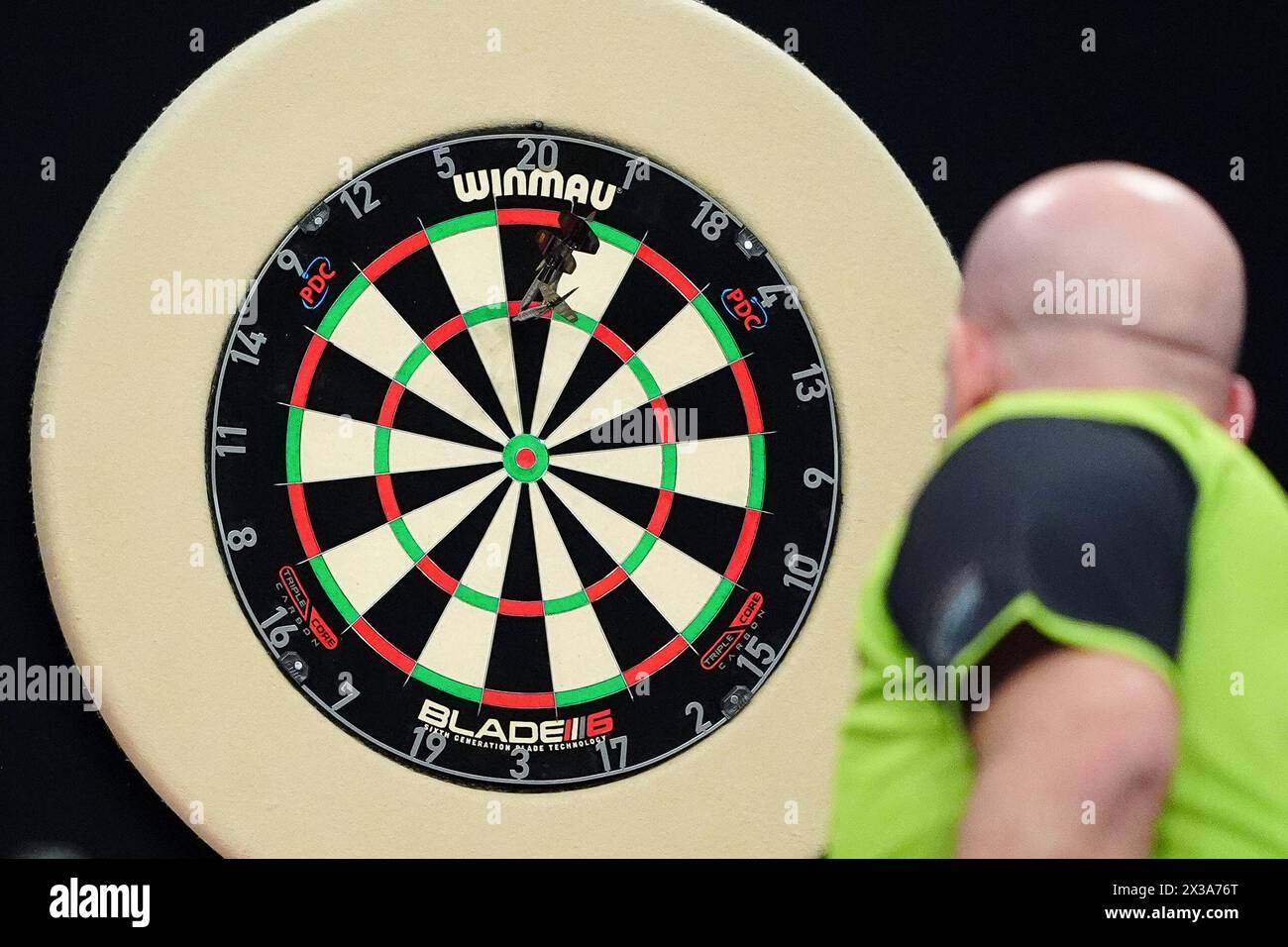 General view of the dartboard with Michael van Gerwen in action against Peter Wright (not pictured) on night thirteen of the 2024 BetMGM Premier League at the M&S Bank Arena, Liverpool. Picture date: Thursday April 25, 2024. Stock Photo