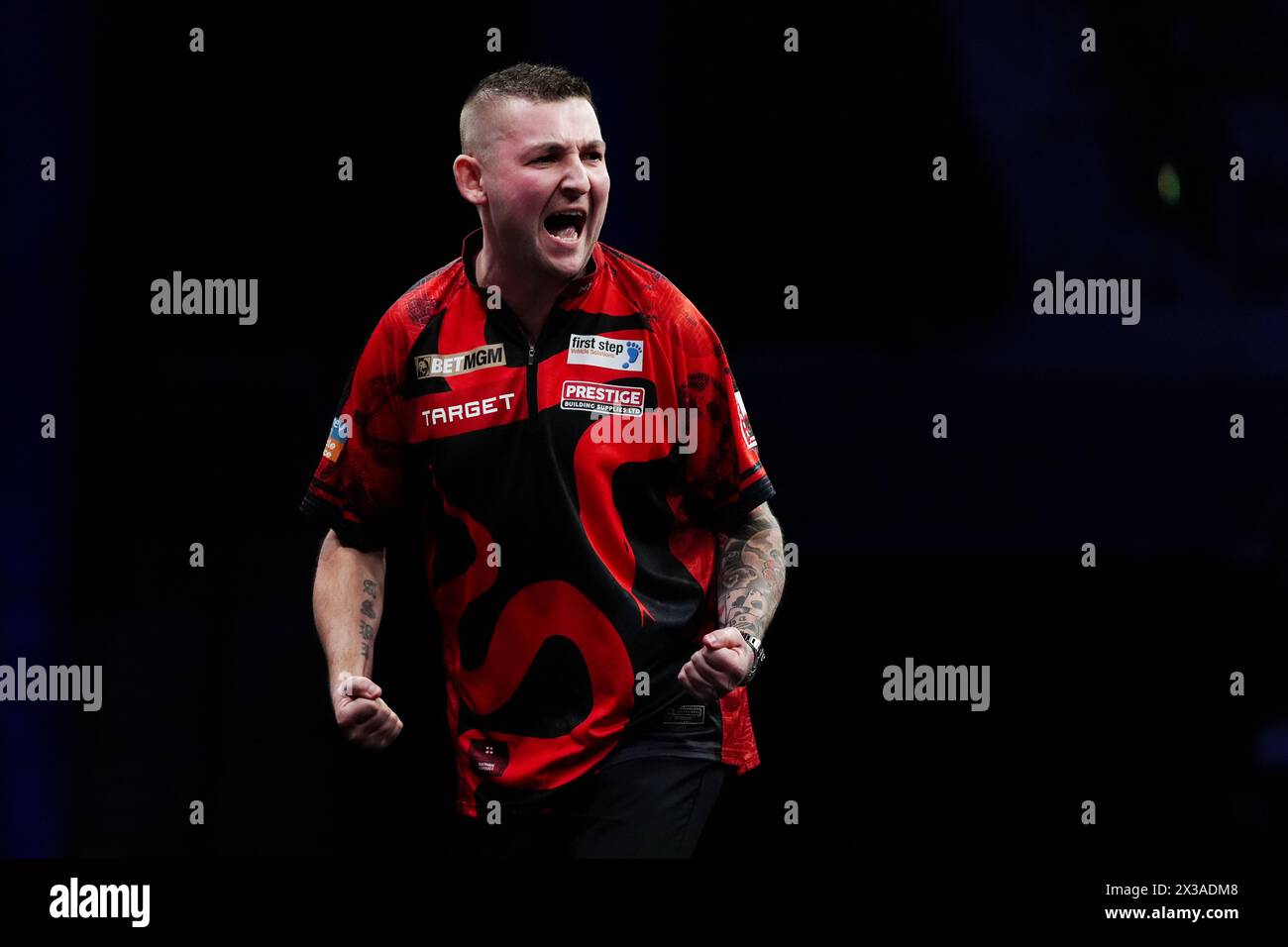 Nathan Aspinall celebrates during his match against Luke Littler (not pictured) on night thirteen of the 2024 BetMGM Premier League at the M&S Bank Arena, Liverpool. Picture date: Thursday April 25, 2024. Stock Photo