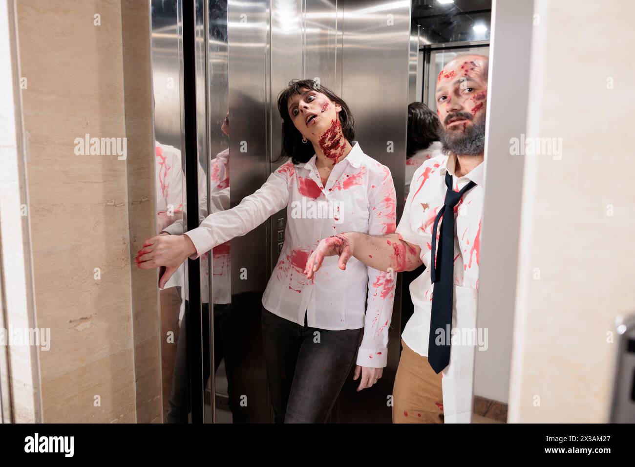Workers coming out of office building elevator dressed as creepy zombies during Halloween holiday. Colleagues covered in fake scars pretending to be feral cadavers exiting escalator Stock Photo