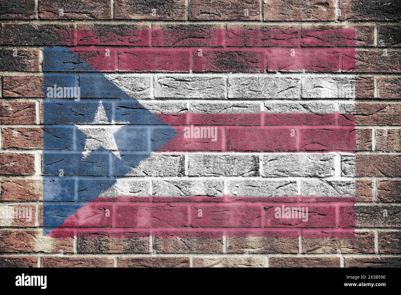 Puerto Rico flag on old brick wall background Stock Photo