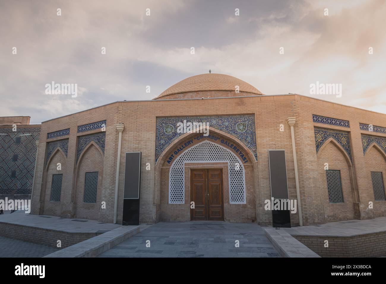 JUNE 23,2023, SAMARKAND, UZBEKISTAN: Close up on the art gallery, Samarkand, Uzbekistan. Sunset sky, copy space for text Stock Photo