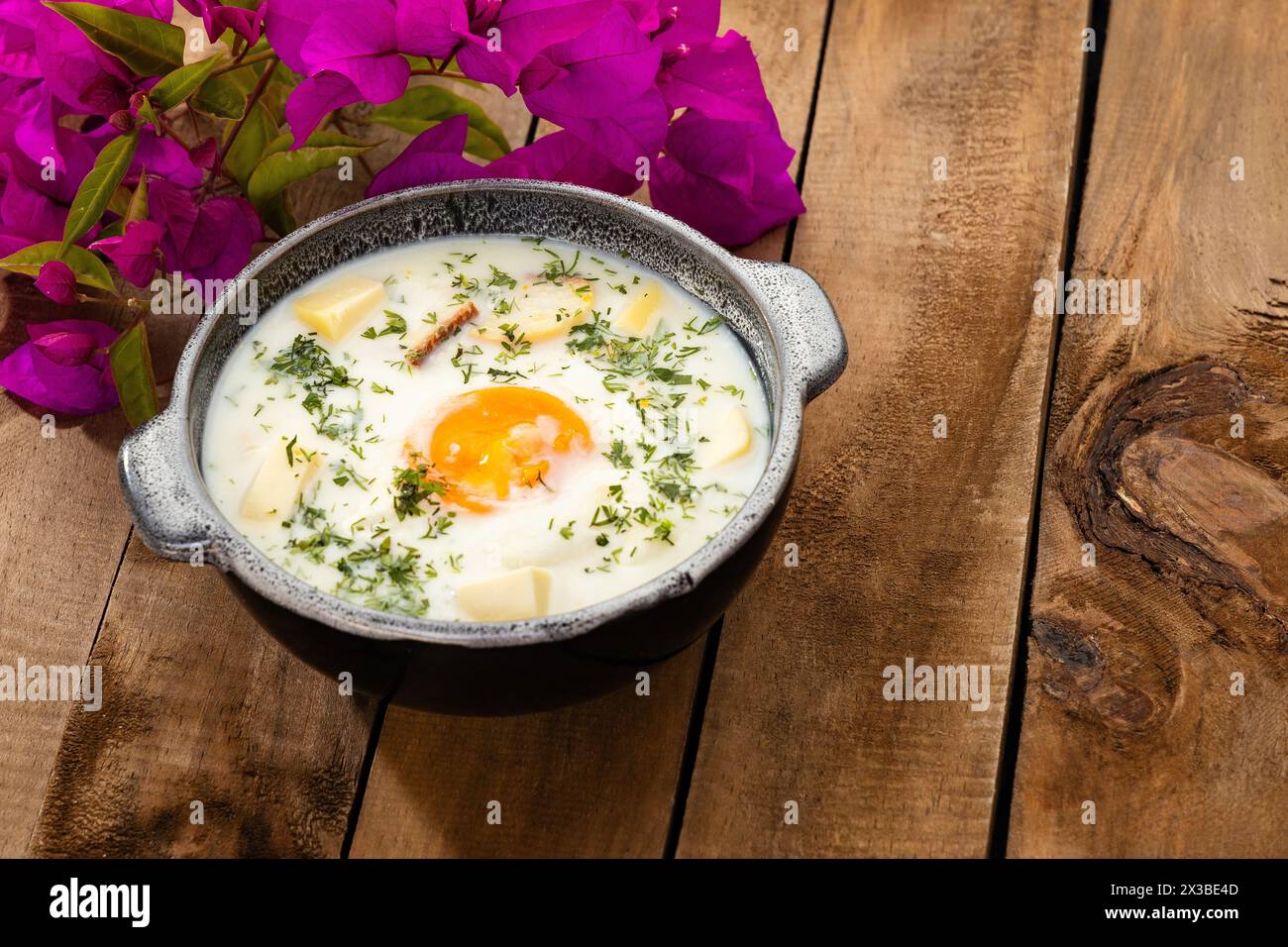Changua - Egg with milk, typical soup for breakfast in Bogota Stock Photo