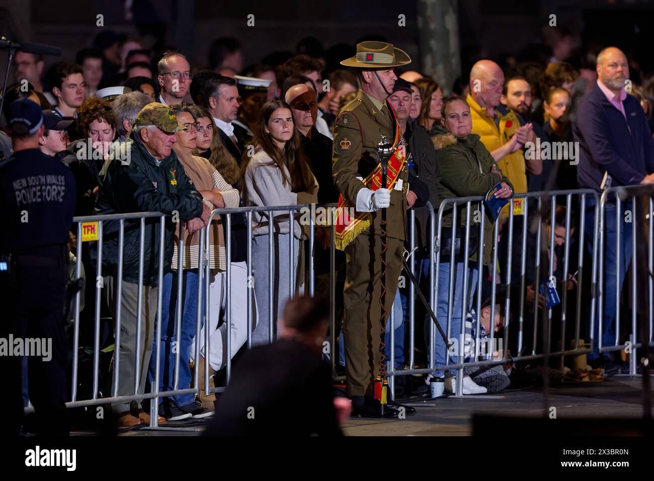 Sydney, Australia. 25th Apr, 2024. The general public looks on during the ANZAC Day Dawn Service at the Martin Place Cenotaph on April 25, 2024 in Sydney, Australia Credit: IOIO IMAGES/Alamy Live News Stock Photo