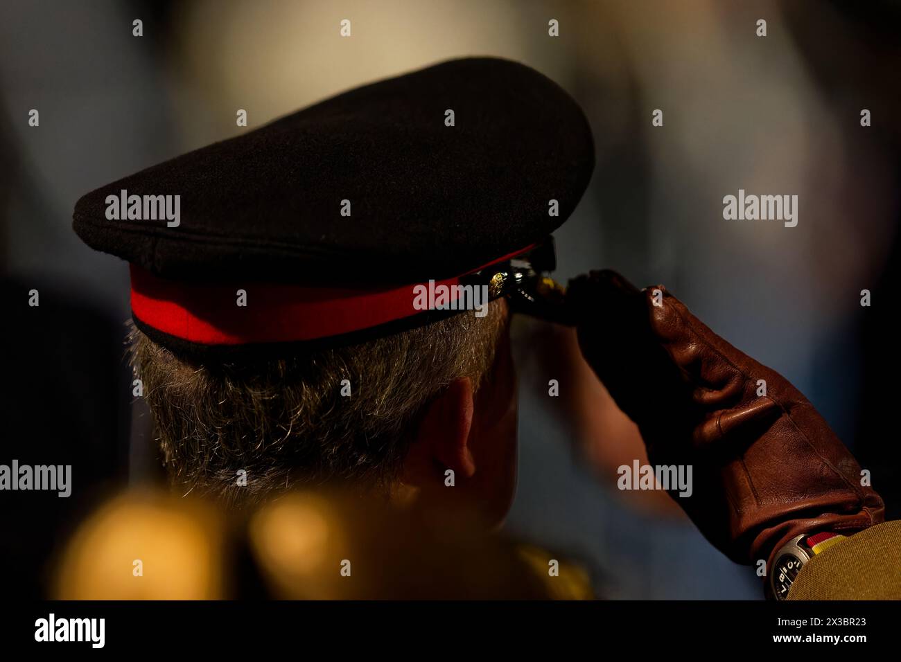 Sydney, Australia. 25th Apr, 2024. A soldier salutes during the ANZAC Day Dawn Service at the Martin Place Cenotaph on April 25, 2024 in Sydney, Australia Credit: IOIO IMAGES/Alamy Live News Stock Photo