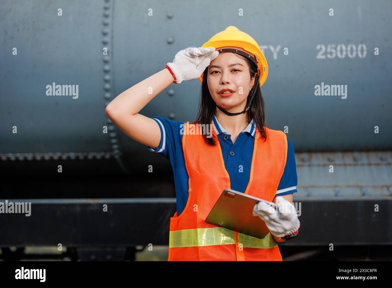 Tired exhausted women worker. engineer train service maintenance locomotive hot sweating. Stock Photo