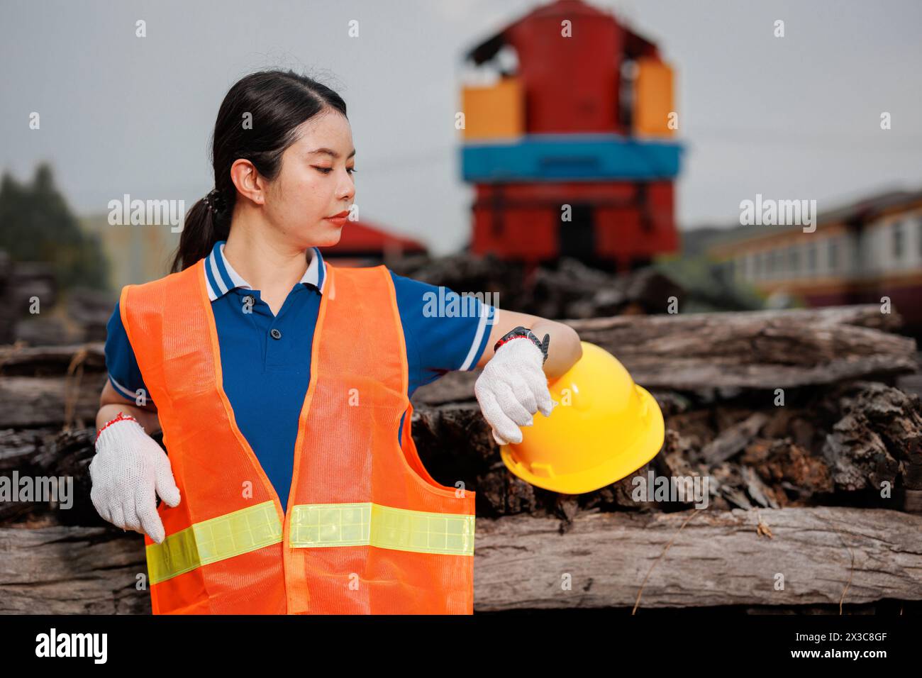 women engineer looking at wrist watch working service maintenance train