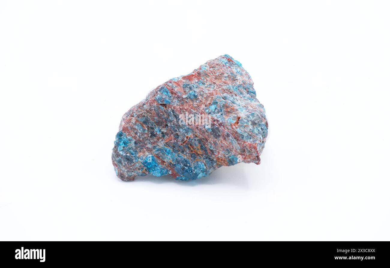 Papagoite mineral composed of calcium copper aluminum silicate hydroxide a rare gemstone in Arizona United States.  Isolated on white background Stock Photo