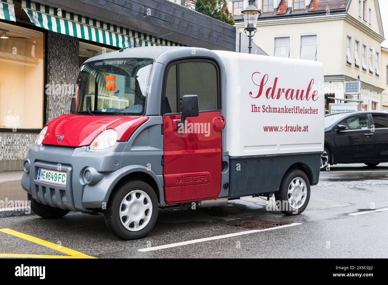 MELK, AUSTRIA - MAY 12, 2019: This is a modern French electric cargo van D-Truck Aixam Mega. Stock Photo