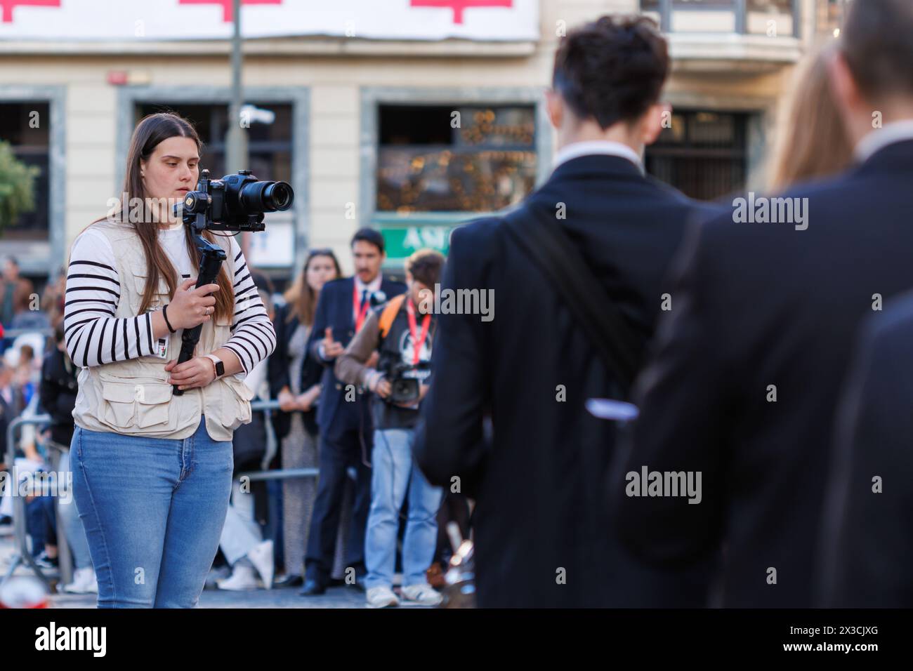 Alcoy, Spain, 04-19-2024: Media worker covering the news of the Moors and Christians festival in Alcoy, pasodoble festival Stock Photo