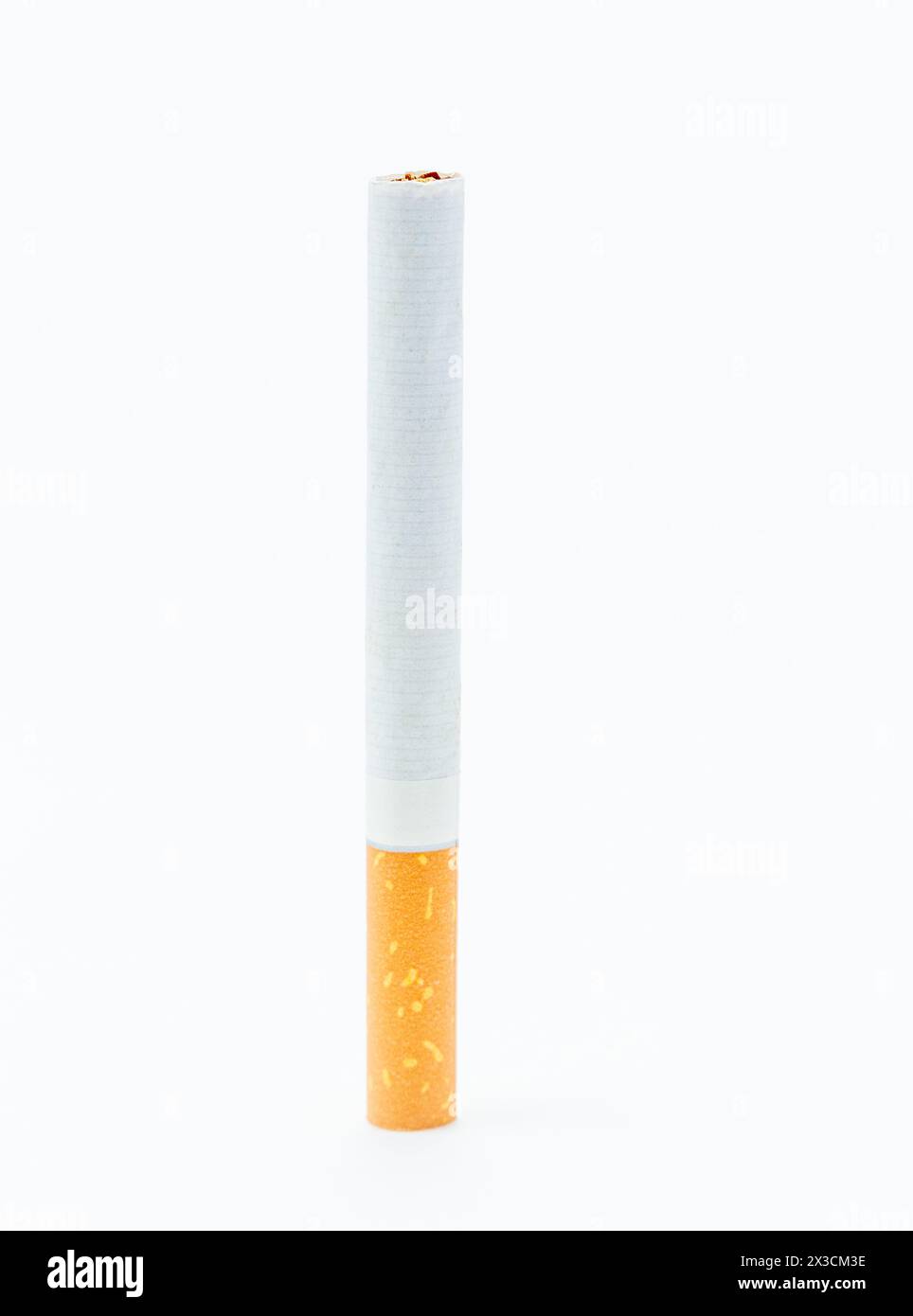 A single cigarette on a white background Stock Photo