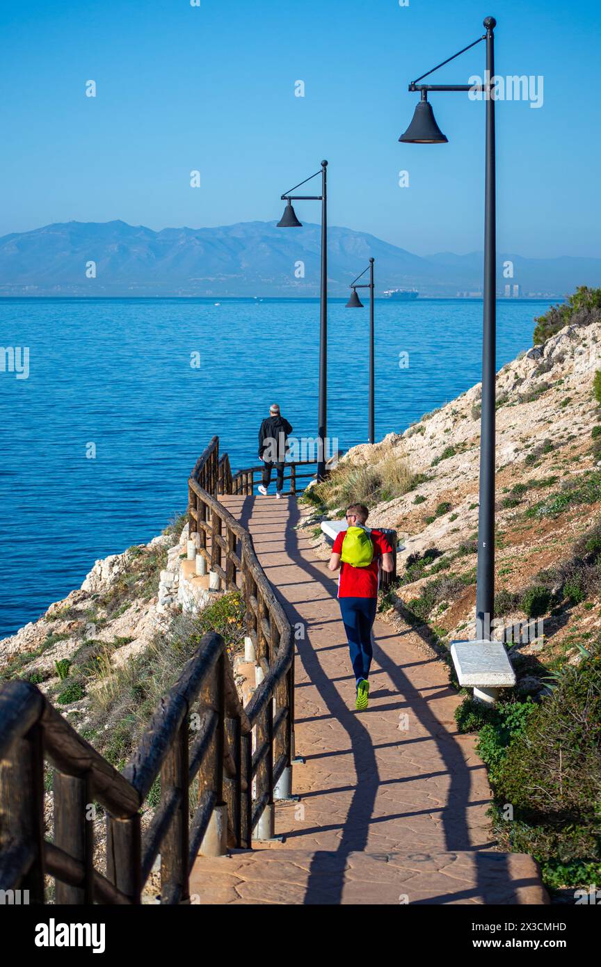 Spain Rincon RINCON DE LA VICTORIA, SPAIN - FEBRUARY 21, 2024: Morning walking on ...