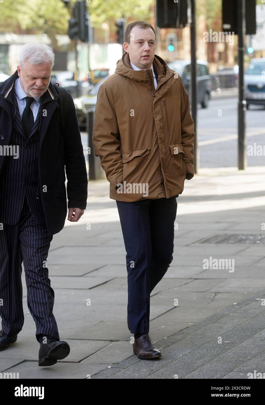Christopher Berry (right) arrives at Westminster Magistrates' Court ...