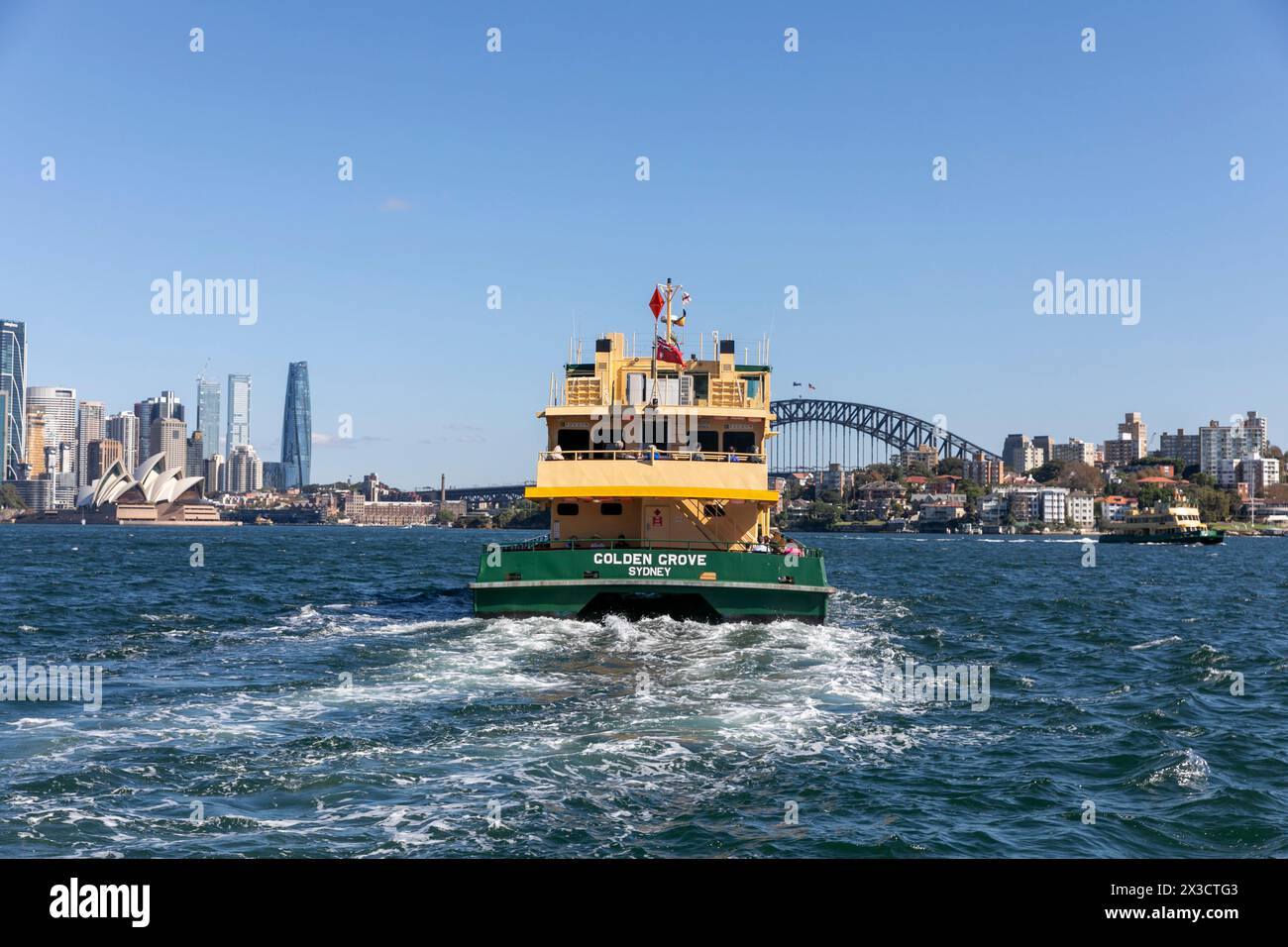 Sydney Harbour, Sydney ferry the MV Golden Grove heads towards Sydney ...