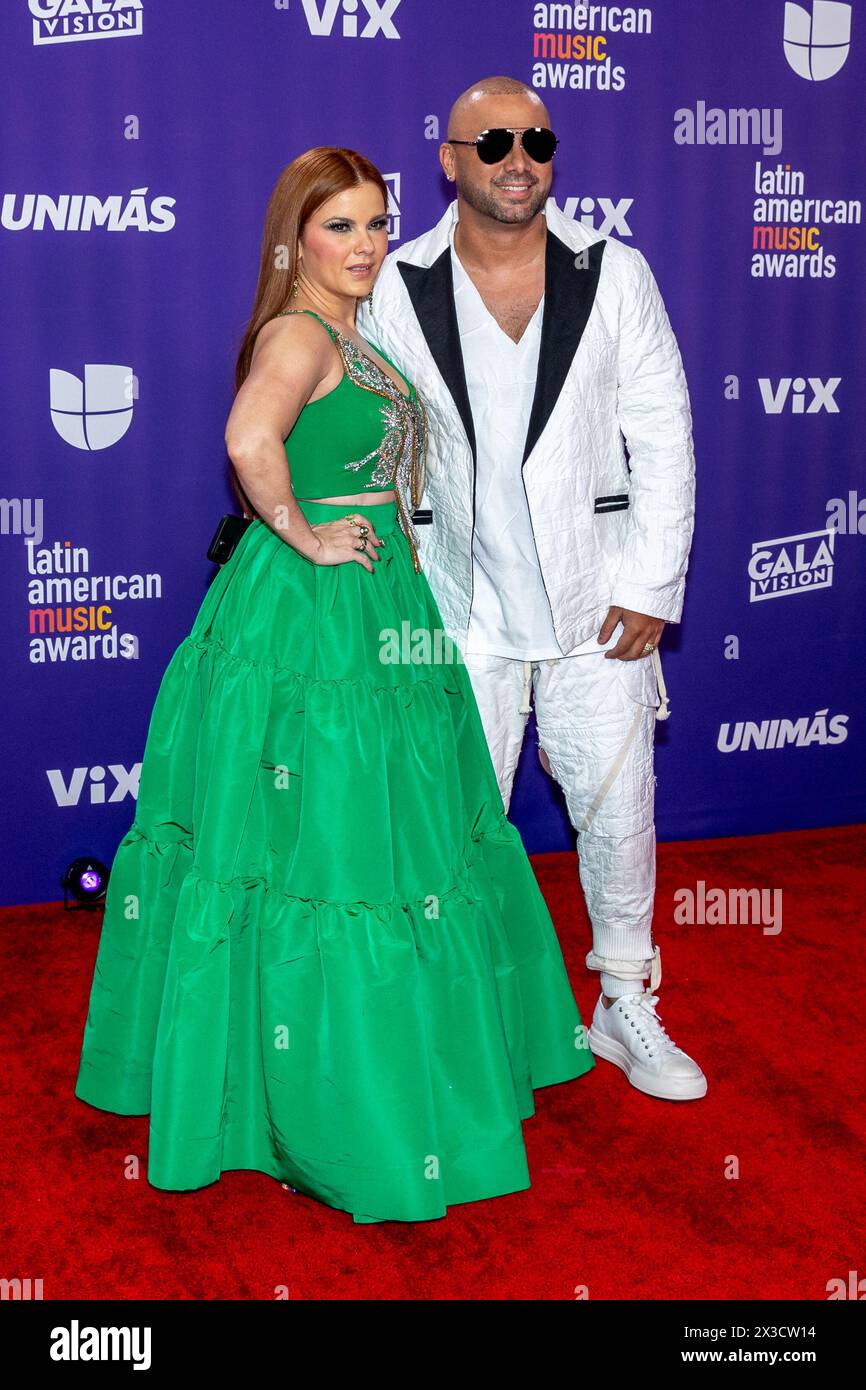 Las Vegas, USA. 25th Apr, 2024. Yomaira Ortiz Feliciano (L) and Wisin attend the 2024 Latin American Music Awards (Latin AMAs) at the MGM Grand Garden Arena in Las Vegas, Nevada on April 25, 2024. (Photo by Travis P Ball/Sipa USA) Credit: Sipa USA/Alamy Live News Stock Photo