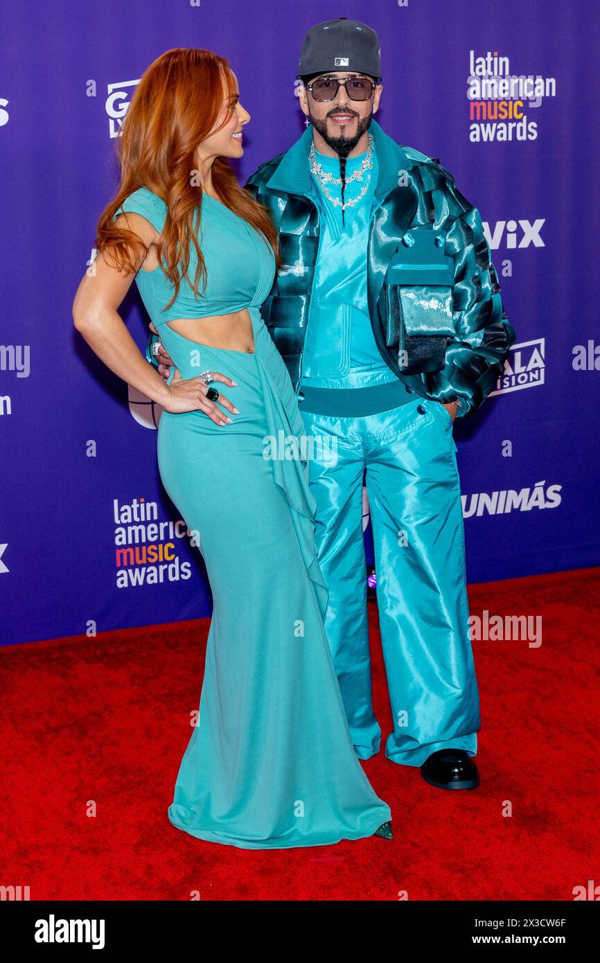 Edneris Espada Figueroa (L) and Yandel attend the 2024 Latin American