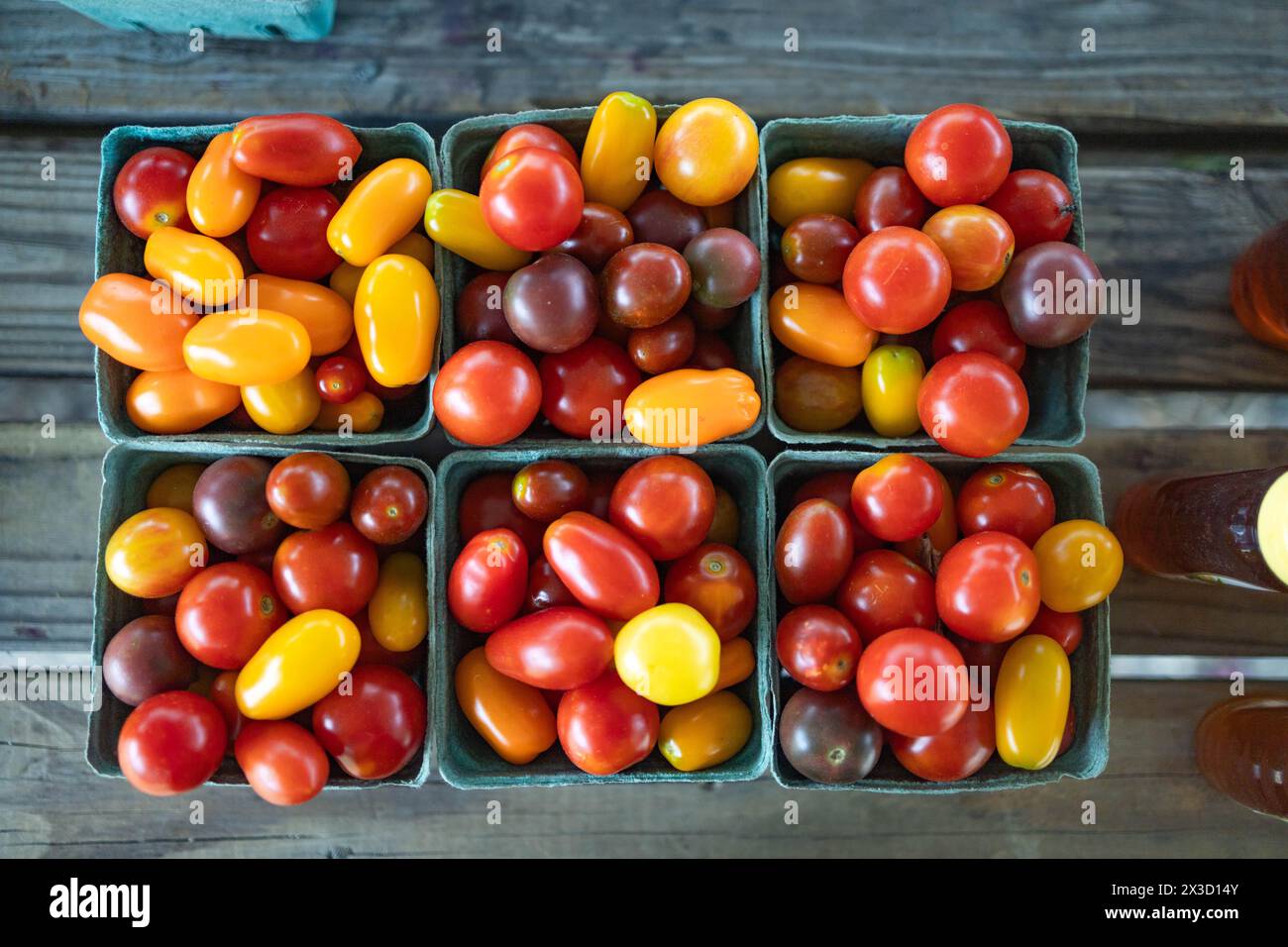 Heirloom Cherry Tomatoes in Paper Crates Stock Photo - Alamy