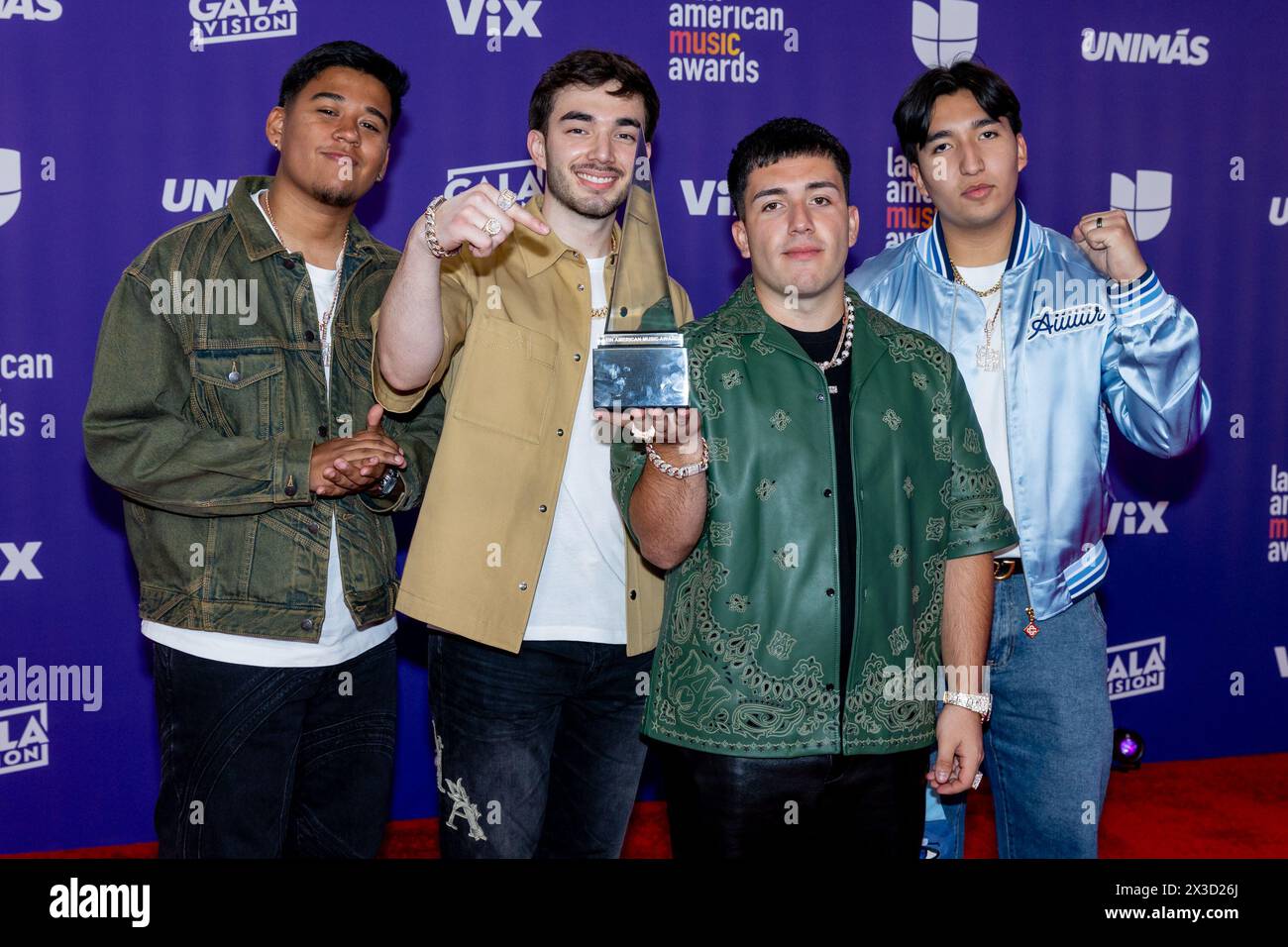 Las Vegas, USA. 25th Apr, 2025. Eslabon Armado show off their award at