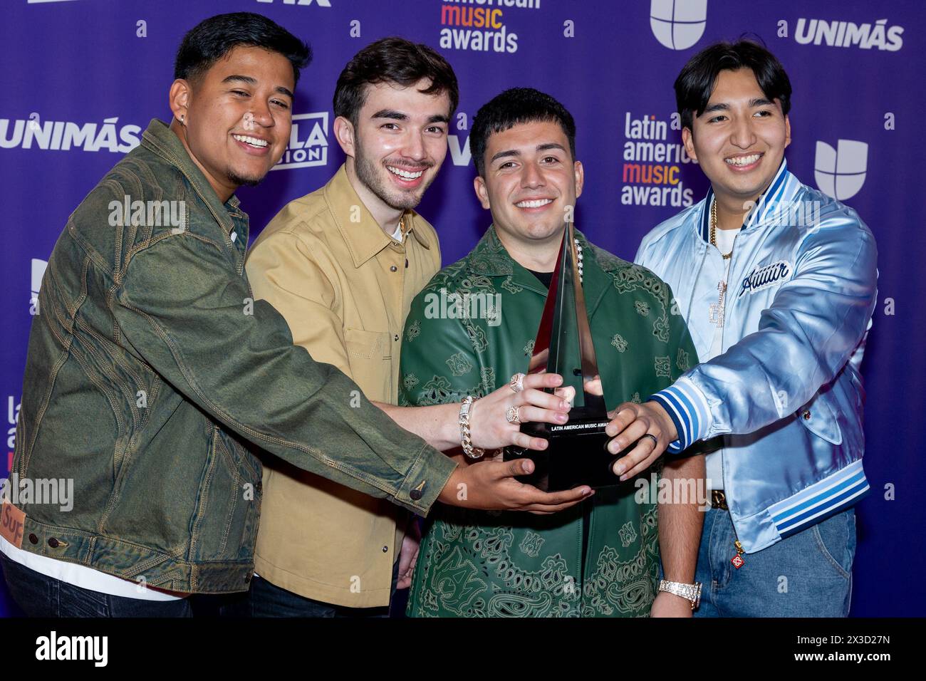 Las Vegas, USA. 25th Apr, 2025. Eslabon Armado show off their award at