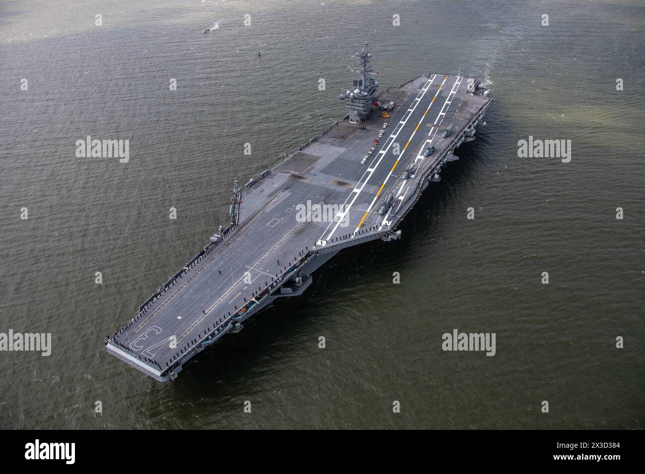 NORFOLK, Va. (April 25, 2024) The Nimitz-class aircraft carrier USS George Washington (CVN 73) departs Naval Station Norfolk, April 25, 2024, for a de Stock Photo