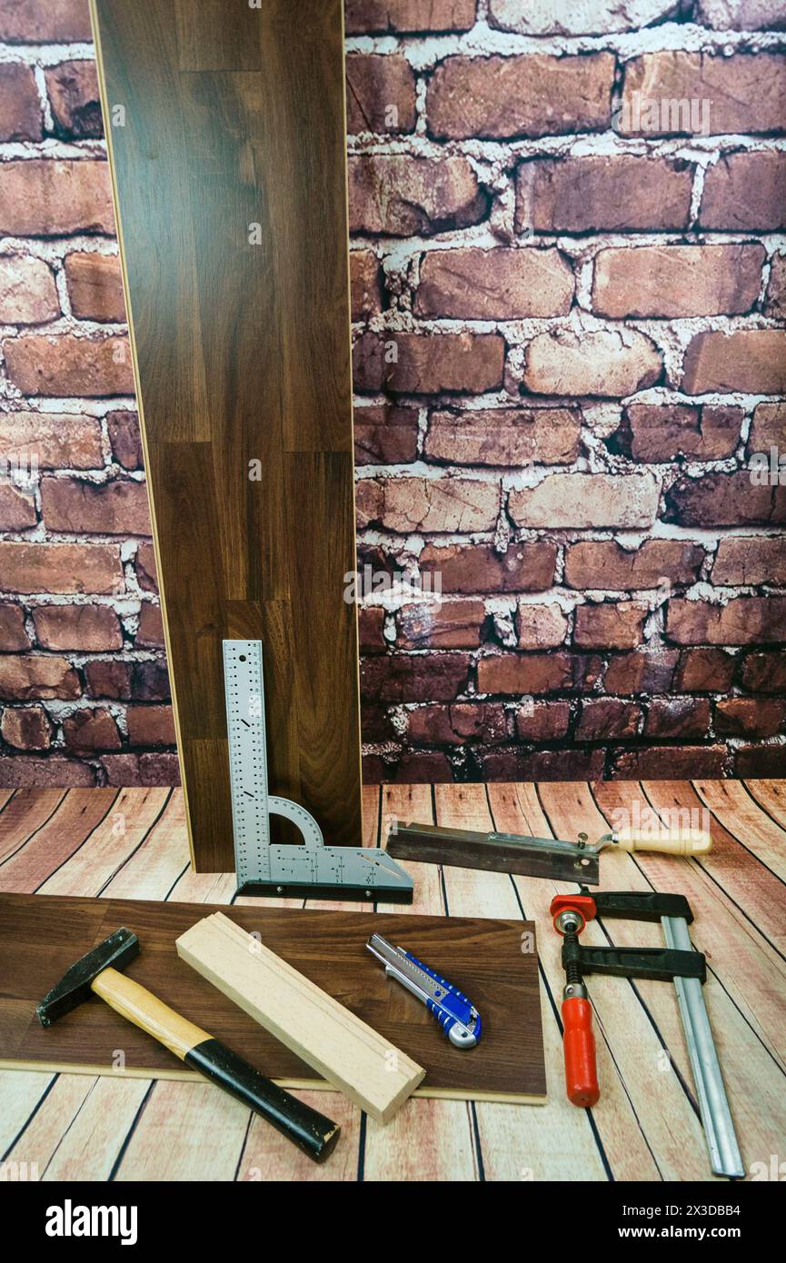 tools for laying laminate Stock Photo - Alamy