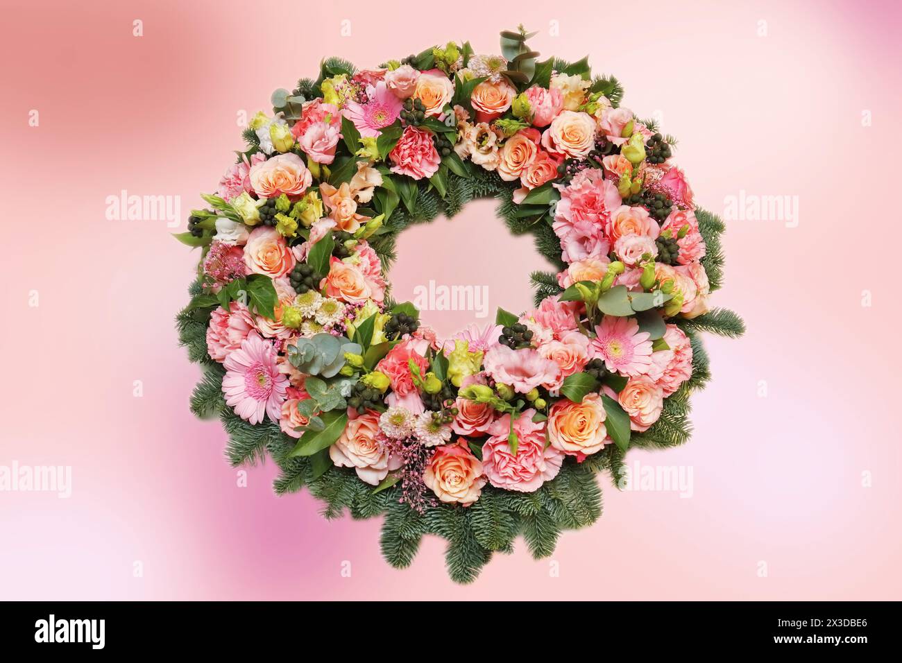 funeral wreath with pink blossoms Stock Photo