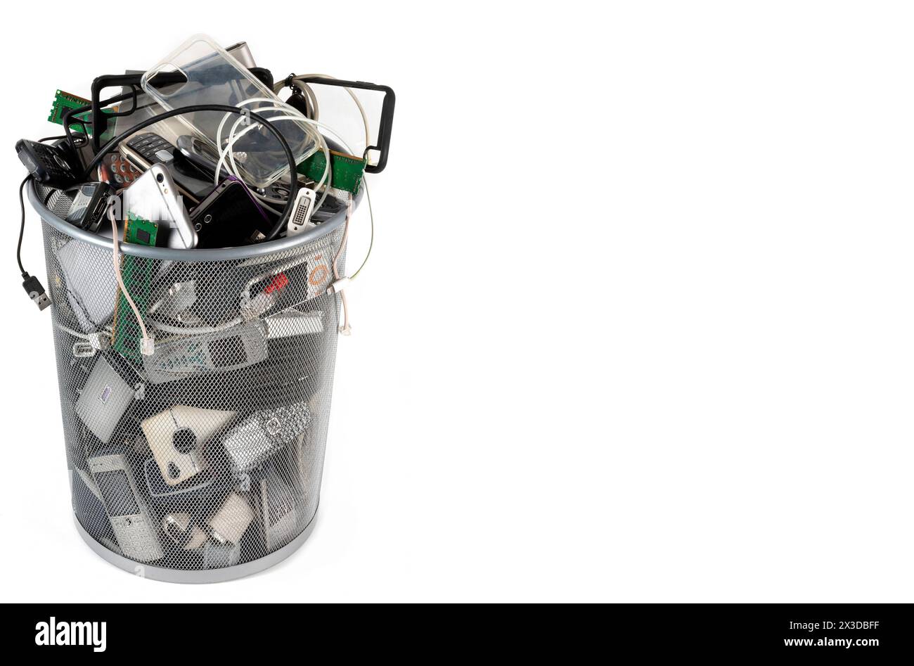 Old Cell Phones and Electronic Waste - Obsolete Technology for Recycling - Space for text. Stock Photo