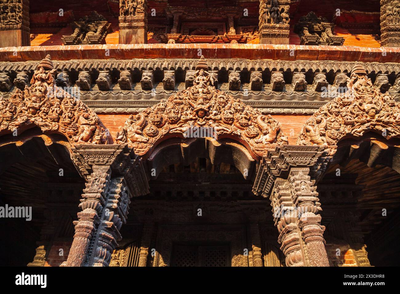 Relief carving on a hindu temple at the Patan Durbar Square in Lalitpur or historically Patan city near in Kathmandu in Nepal Stock Photo