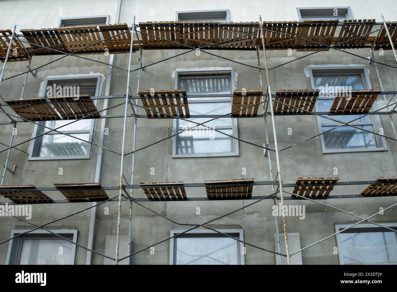 Scaffolding on the facade of a building under construction Stock Photo ...