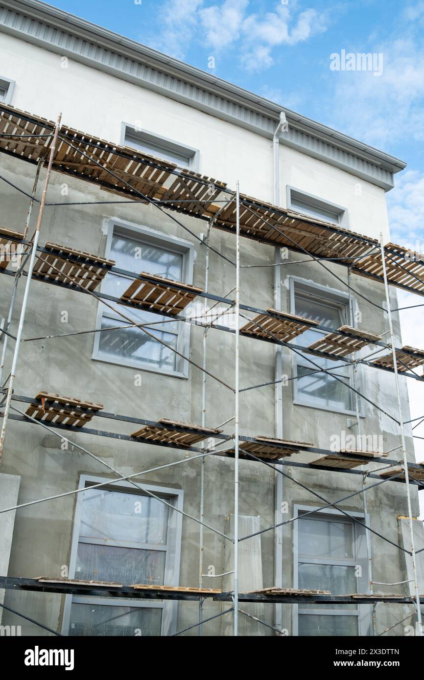Scaffolding on the facade of a building under construction Stock Photo ...