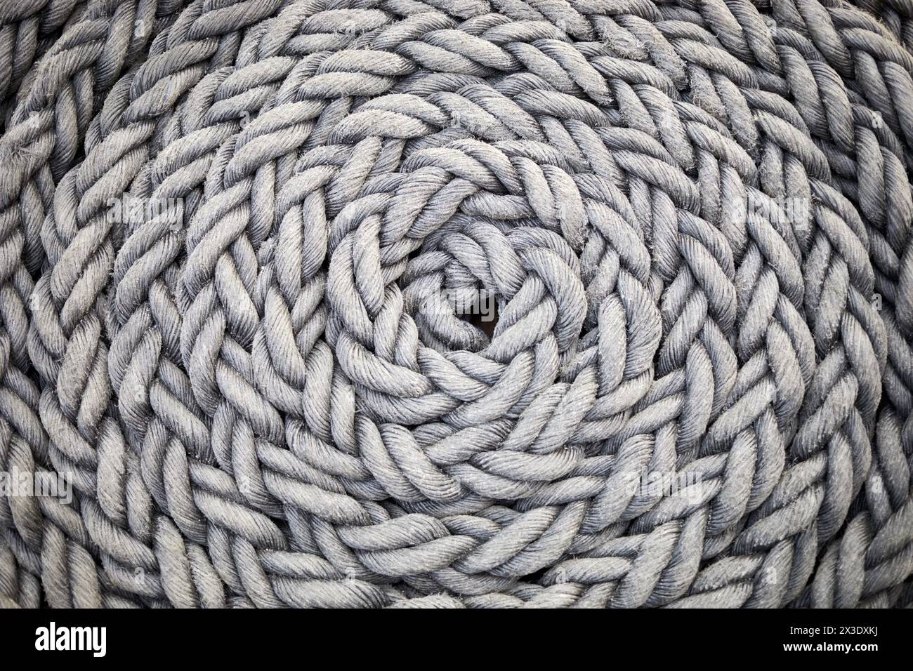Round coil of ship rope Stock Photo - Alamy