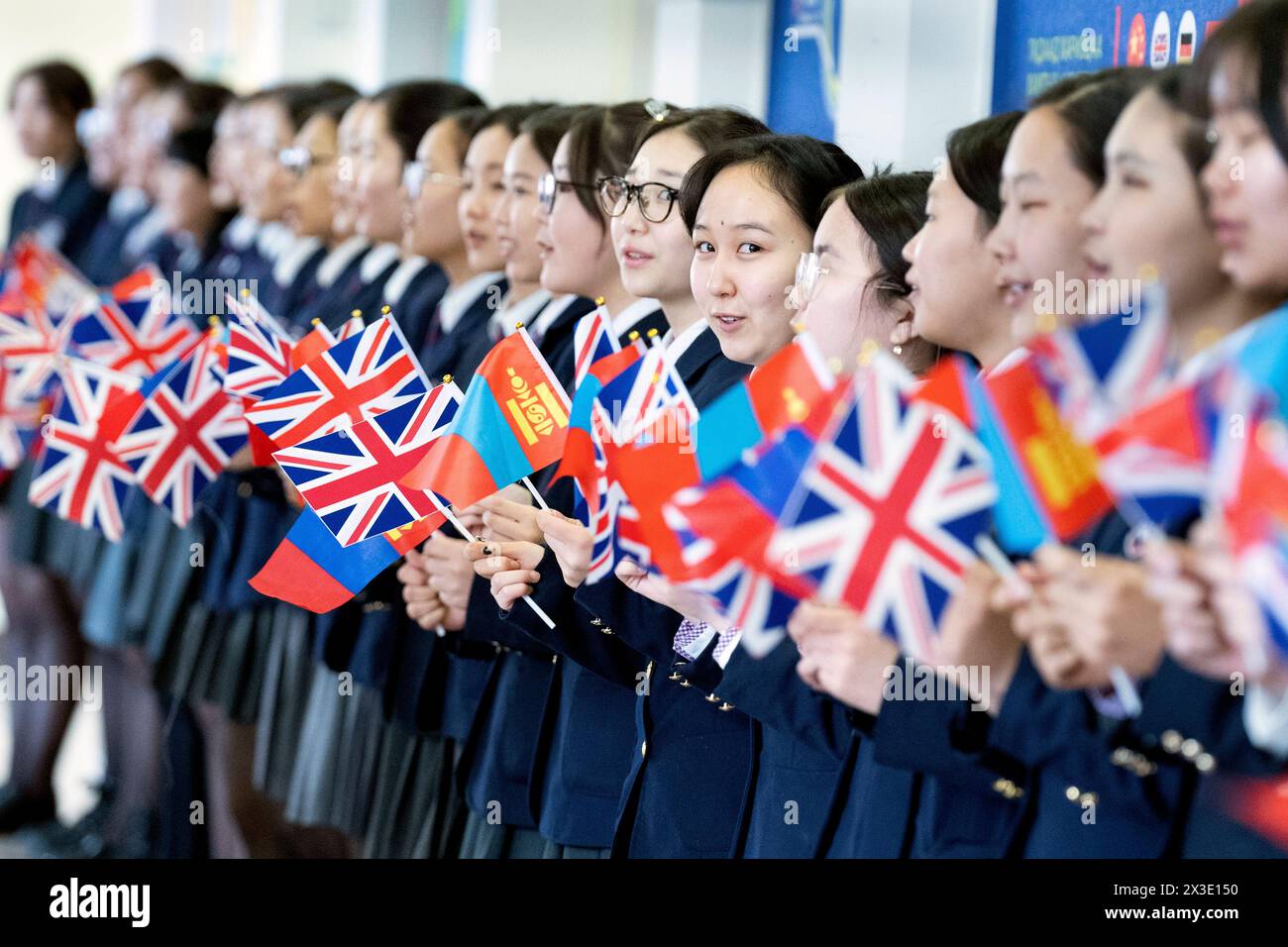 British Foreign Secretary Lord David Cameron is greeted by pupils at ...