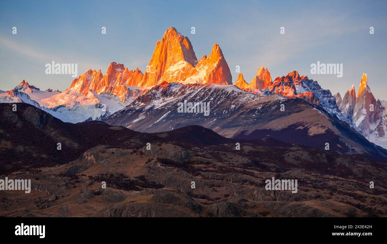 Monte Fitz Roy or Cerro Chalten aerial sunrise view. Fitz Roy is a mountain located near El Chalten, in the Southern Patagonia, on the border between Stock Photo