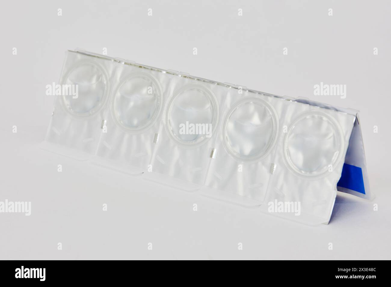 Contacts Package Package of contact lenses on white background Stock Photo - Alamy