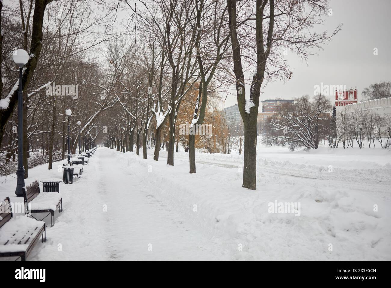 Alley benches in snowy city hi-res stock photography and images - Alamy