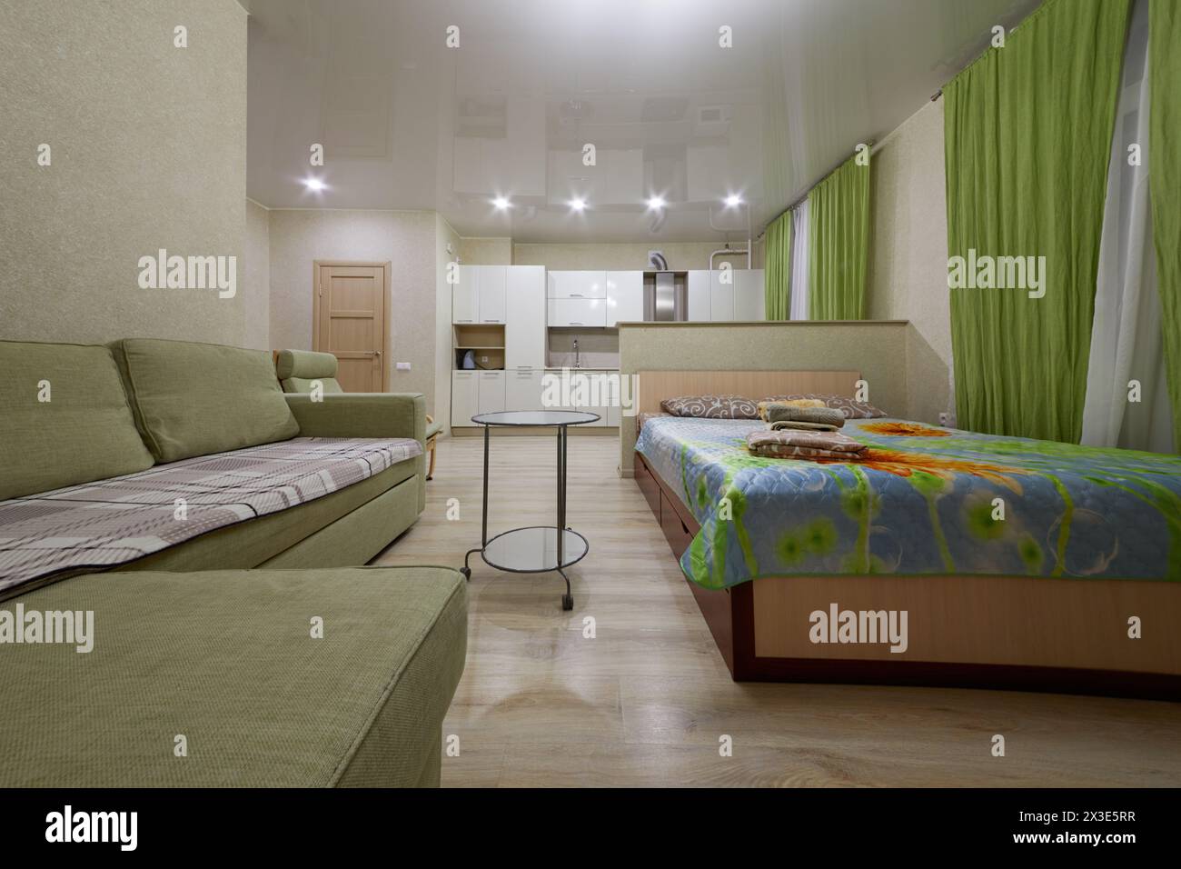 KAZAN, RUSSIA - DEC 7, 2017: Modern flat divided into kitchen and living zones in hotel Apartments on Bauman. Apartments located near Kazan Kremlin an Stock Photo