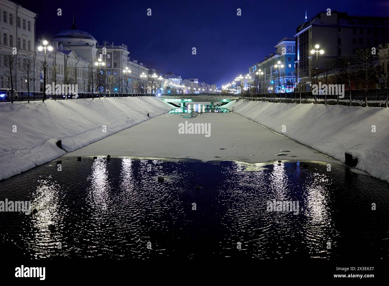 KAZAN, RUSSIA - DEC 8, 2017: River Bulak - channel in the Vakhitovsky district of Kazan on winter evening. River name came from an obsolete tatar word Stock Photo