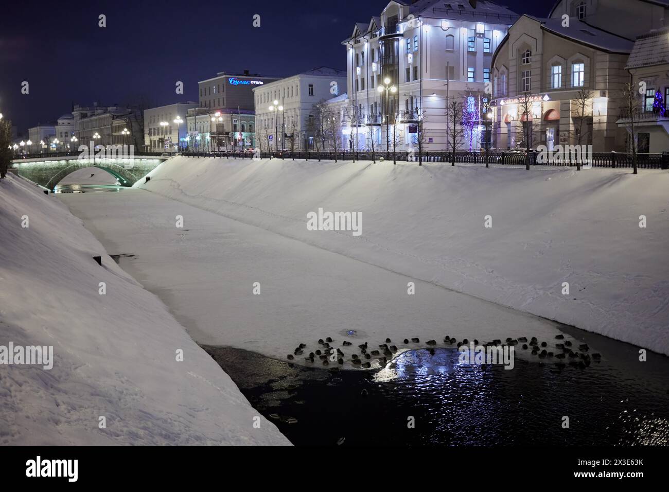 KAZAN, RUSSIA - DEC 08, 2017: Bulak river under ice and snow on winter evening. River name came from an obsolete tatar word Bolak meaning small river. Stock Photo