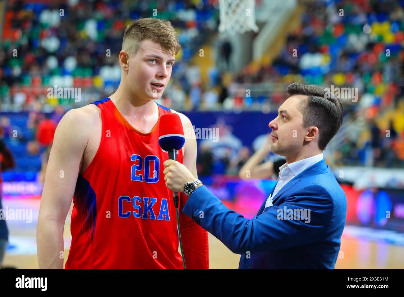 Interview with basketball player at basketball game in stadium Stock Photo