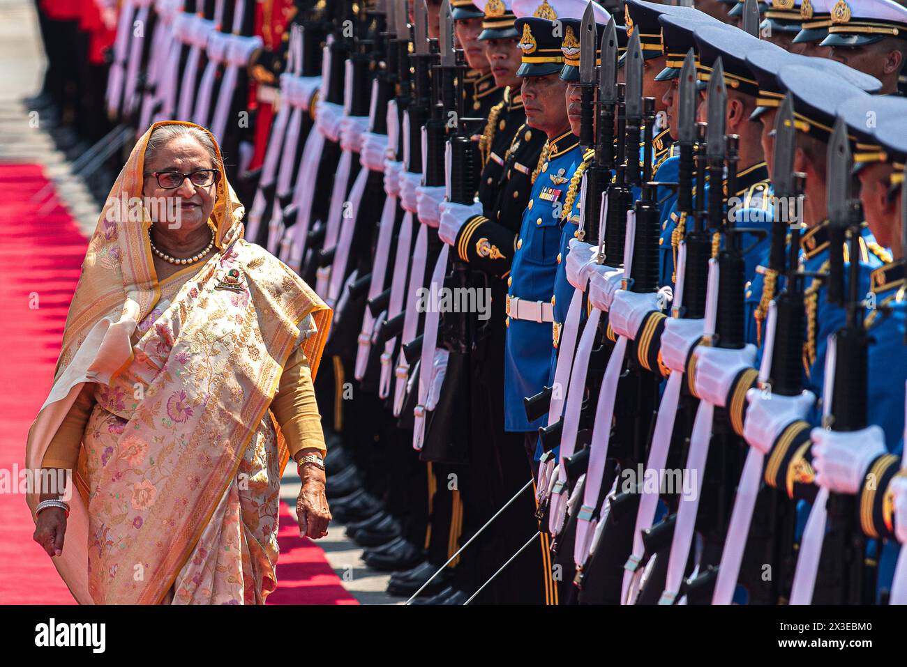 Bangkok, Thailand. 26th Apr, 2024. Bangladesh's prime minister Sheikh Hasina inspects the guard of honor during a welcoming ceremony at Government House. Bangladesh's prime minister Sheikh Hasina is on a six-day official visit to Thailand that aim to strengthen ties between the two nations. Sheikh Hasina is the first prime minister of Bangladesh who official visit Thailand since 2002. (Photo by Peerapon Boonyakiat/SOPA Images/Sipa USA) Credit: Sipa USA/Alamy Live News Stock Photo