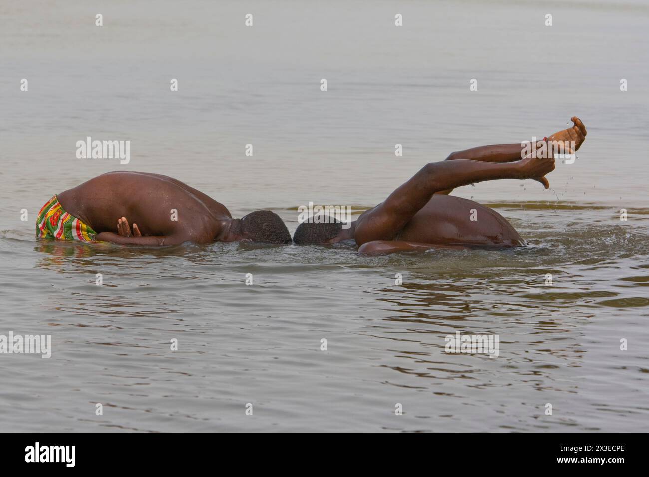 BATHING IN THE MONO RIVER BENIN Stock Photo