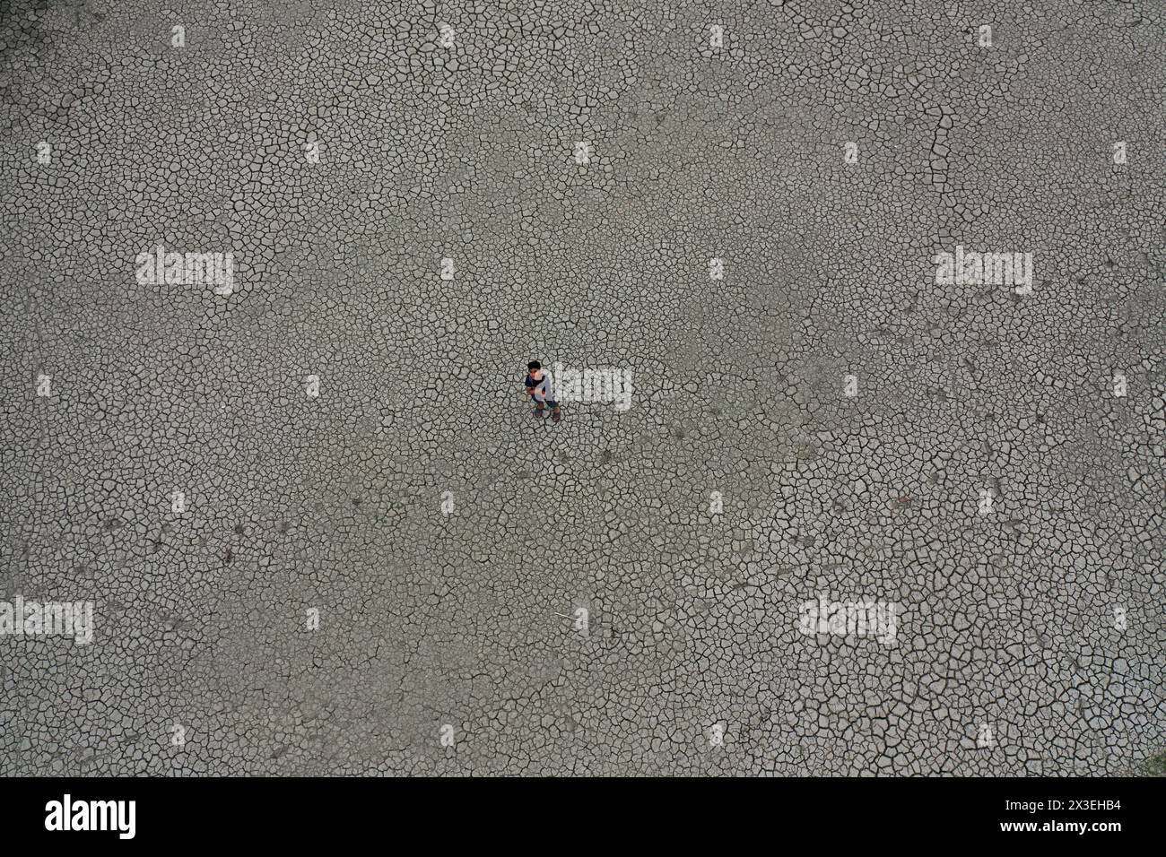 Khulna, Bangladesh - April 11, 2024: The intense heat of summer, the water has dried up and the soil has burst in the coastal region of Khulna distric Stock Photo
