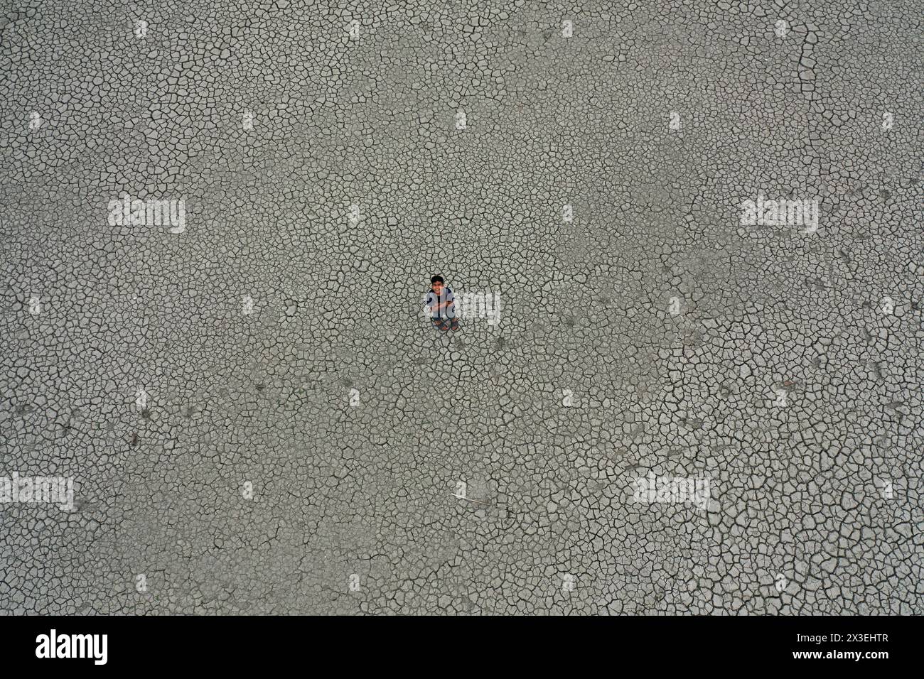 Khulna, Bangladesh - April 11, 2024: The intense heat of summer, the water has dried up and the soil has burst in the coastal region of Khulna distric Stock Photo