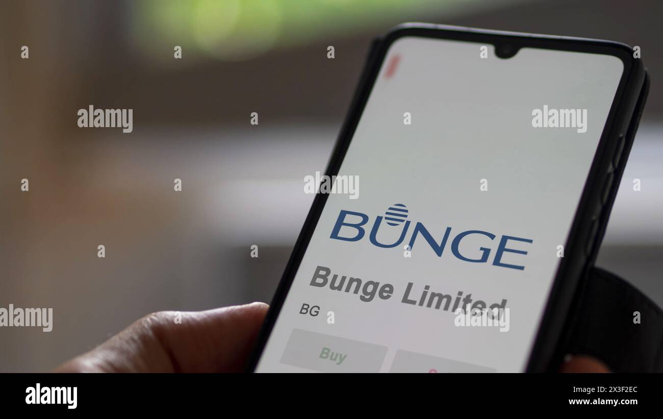 Bunge Limited on the screen of an exchange. Bunge Limited price stocks, $BG on a device. Stock Photo