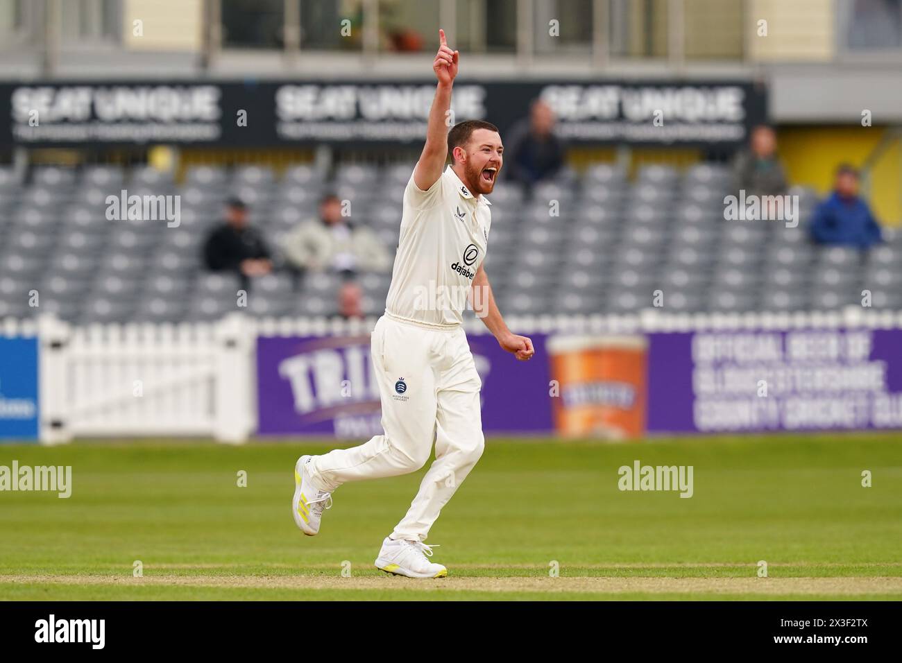 Bristol, UK, 26 April 2024. Middlesex's Ryan Higgins celebrates taking the wicket of Gloucestershire's Cameron Bancroft during the Vitality County Championship Division Two match between Gloucestershire and Middlesex. Credit: Robbie Stephenson/Gloucestershire Cricket/Alamy Live News Stock Photo