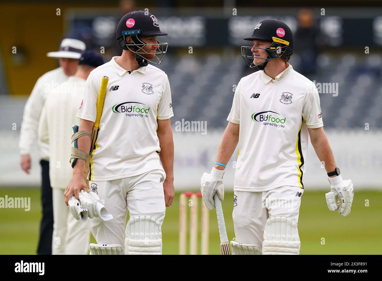 Bristol, UK, 26 April 2024. Gloucestershire's James Bracey (left) and Gloucestershire's Miles Hammond walk off the field after bad light stops play during the Vitality County Championship Division Two match between Gloucestershire and Middlesex. Credit: Robbie Stephenson/Gloucestershire Cricket/Alamy Live News Stock Photo
